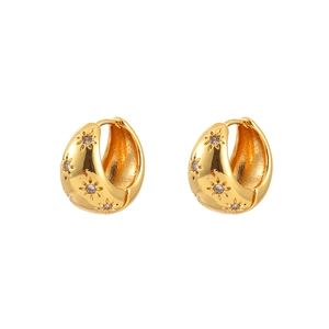 Gold-plated hoop earrings with starburst engraving and cubic zirconia center