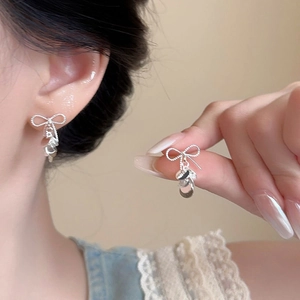 Silver bow stud earrings with sequins and fringe design for a minimalist elegant style
