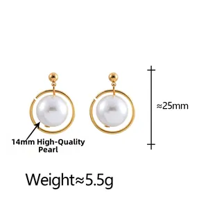 Macro view of gold hoop earrings featuring high-luster 14mm white pearls