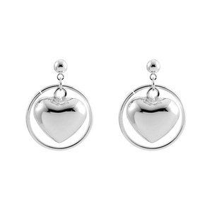 Close-up of polished silver heart pendants with 3D design and mirror finish