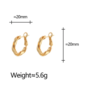 Matte gold twisted hoop earrings with 20mm diameter and elegant textured finish