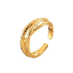 Elegant gold-tone layered ring featuring textured overlapping bands in an open design