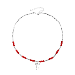 Elegant beaded necklace with red resin beads, silver irregular beads, and bow pendant