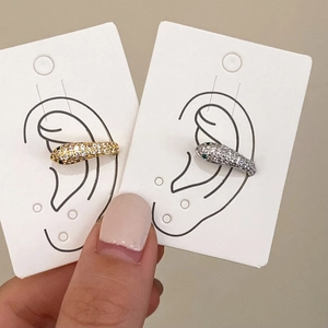 Orecchini a serpente vintage in oro e argento con zirconi e pietre verdi negli occhi