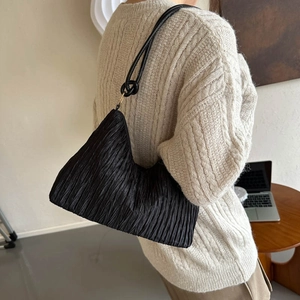 Chic black pleated corduroy hobo shoulder bag with knot detail and sleek leather strap