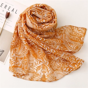 Ginger yellow bali yarn shawl with sequins and tropical leaf print for women