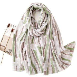 Chic lightweight mint green abstract printed summer scarf with frayed edge for women