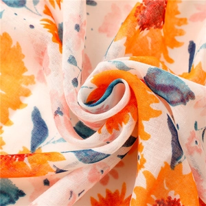 Detail of floral printed breathable cotton shawl showing vibrant patterns and soft texture