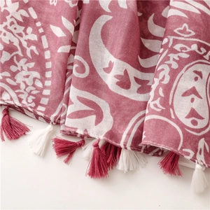 Detail of navy paisley cotton linen scarf with soft fringe and ethnic printed patterns