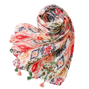 Bohemian style colorful printed scarf with vibrant tassel fringe edges and geometric patterns