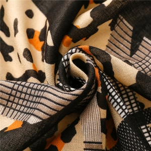 Close-up of leopard print and geometric patterns on soft cotton-linen blend fabric