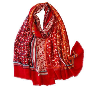 Bohemian style red cotton linen scarf with floral gold foil patterns and frayed edges