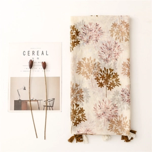 Elegant floral cotton-linen scarf with pom-pom flowers and fringe trim tassels