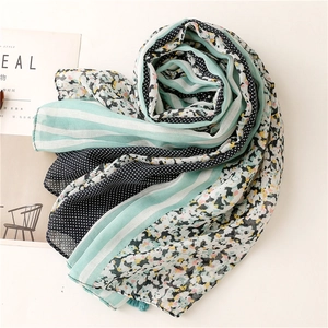 Mint green scarf with floral and polka dot prints on soft cotton linen fabric