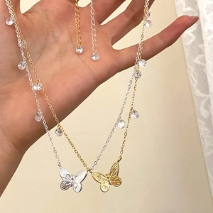 Minimalist gold and silver butterfly pendant necklace with cubic zirconia for women