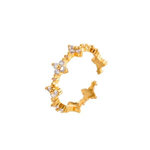 Detail of adjustable gold ring featuring flower-shaped micro-paved white zircons