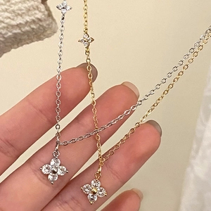 Squisite collane con ciondolo a fiore in oro e argento con zirconi scintillanti da donna