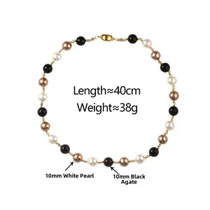Detail of 40cm necklace featuring 10mm black onyx beads and premium synthetic pearls