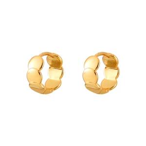 Detailed view of gold wave texture hoop earrings with polished shell pattern relief