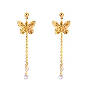 Elegant gold butterfly tassel earrings with cubic zirconia charms on white background