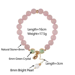 Bracelet en pierres naturelles roses avec cristal vert, pendentif doré et perle