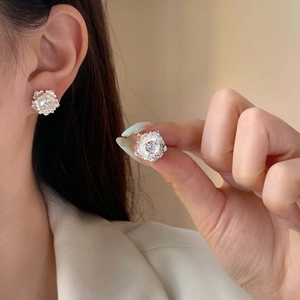 Elegant silver flower stud earrings with sparkling cubic zirconia center for women