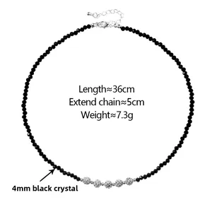Detail view of black crystal bead necklace with silver rhinestone spacers and clasp