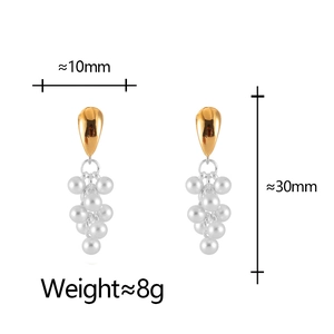 Detail view of grape cluster earrings with pearls and gold-tone finish showing dimensions