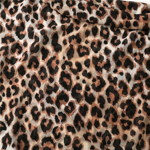 Large leopard print scarf made of lightweight cotton linen with elegant fringe trim