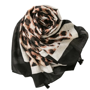 Oversized leopard print cotton linen scarf with elegant black tassels for women