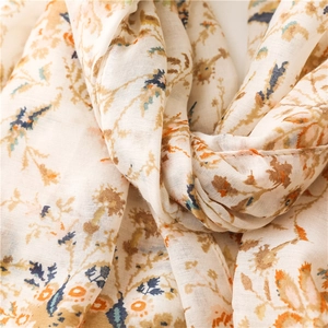 Detailed view of floral pattern and soft texture on cotton linen bohemian scarf