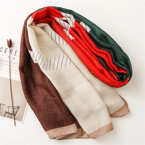 Chic color-block cotton linen scarf with red, green, and cream stripes for travel