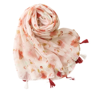 Lightweight pink floral cotton linen scarf with elegant tassel fringe for beach use