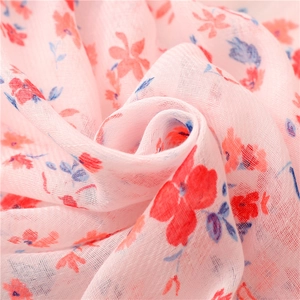 Pink floral cotton scarf for women with soft texture and delicate tassel details