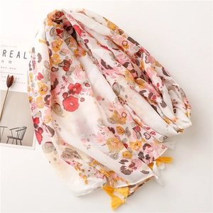 Elegant floral print cotton linen scarf with tassels and abstract artistic patterns