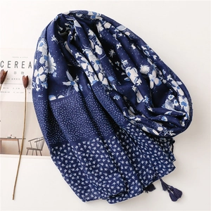 Navy blue cotton linen shawl with blue and white porcelain floral pattern and tassels
