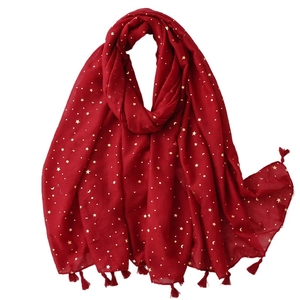 Dark red cotton scarf with gold star moon patterns and tassels on white background