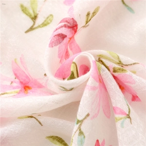 Lightweight cotton linen feel scarf with pink floral print and handmade tassels