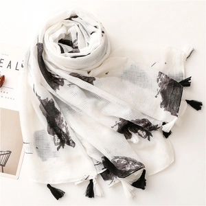 Elegant white linen feel scarf with black hand-painted print and decorative tassels