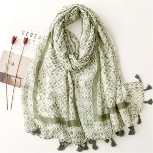 Green kaleidoscope floral cotton-linen scarf with elegant fringe tassels and patterns