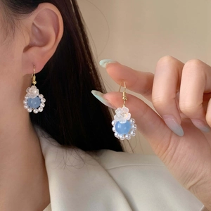 Light blue stone stud earrings with white pearls and flower petal fringe hanging drop