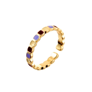 Elegant gold open ring with colorful square enamel stones in purple, yellow, and red