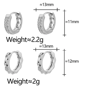 Set of two silver hoop earrings with zircon micro-paving and quilted metal design