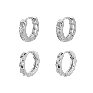 Elegant silver earring set featuring quilted pattern hoops and cubic zirconia pave rings