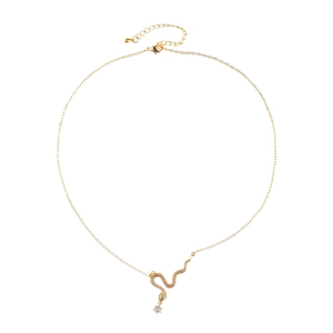 Elegant gold snake pendant necklace with zircon stones and a green gemstone eye