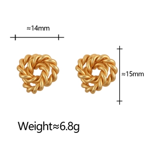 Matte gold twisted hoop earrings with elegant woven texture and vintage minimalist style