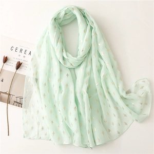 Mint green scarf with gold diamond print and light breathable fabric for women