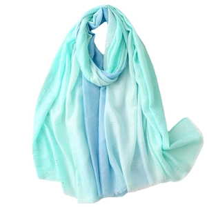 Mint green gradient shawl with gold foil accents in lightweight breathable fabric