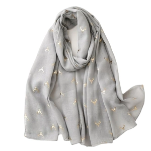 Light gray cotton linen blend scarf featuring elegant gold reindeer head print patterns