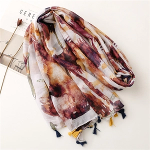 Lightweight ethnic style scarf with artistic watercolor print and tassel accents